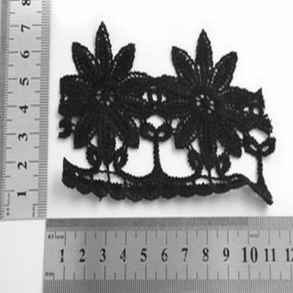 Guipure pol. negro 6.5 cm flor x 15 yd