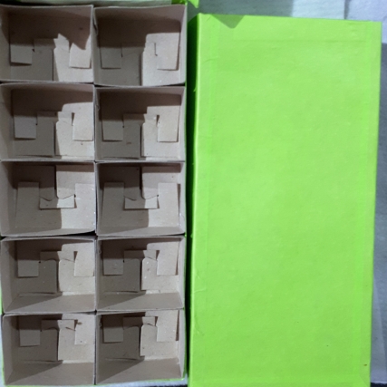 Caja botonera carton x unid
