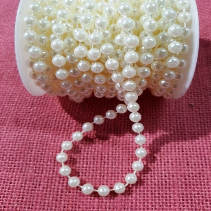 Perla pegada 6 mm blanca en rollo x 10 m